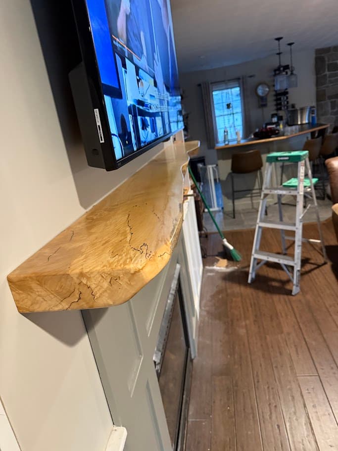 Live edge mantel with natural grain