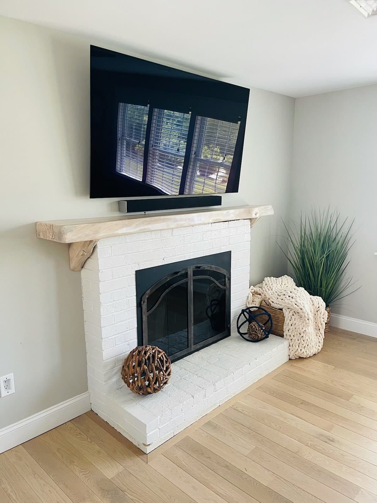 Live edge mantel with corbels